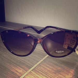 NWT Bebe sunglasses, 100% UV, in great condition.